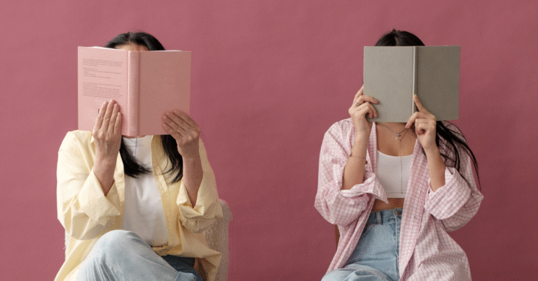 Two women reading books.